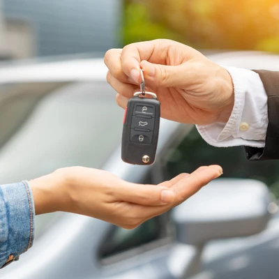 Someone handing over the keys