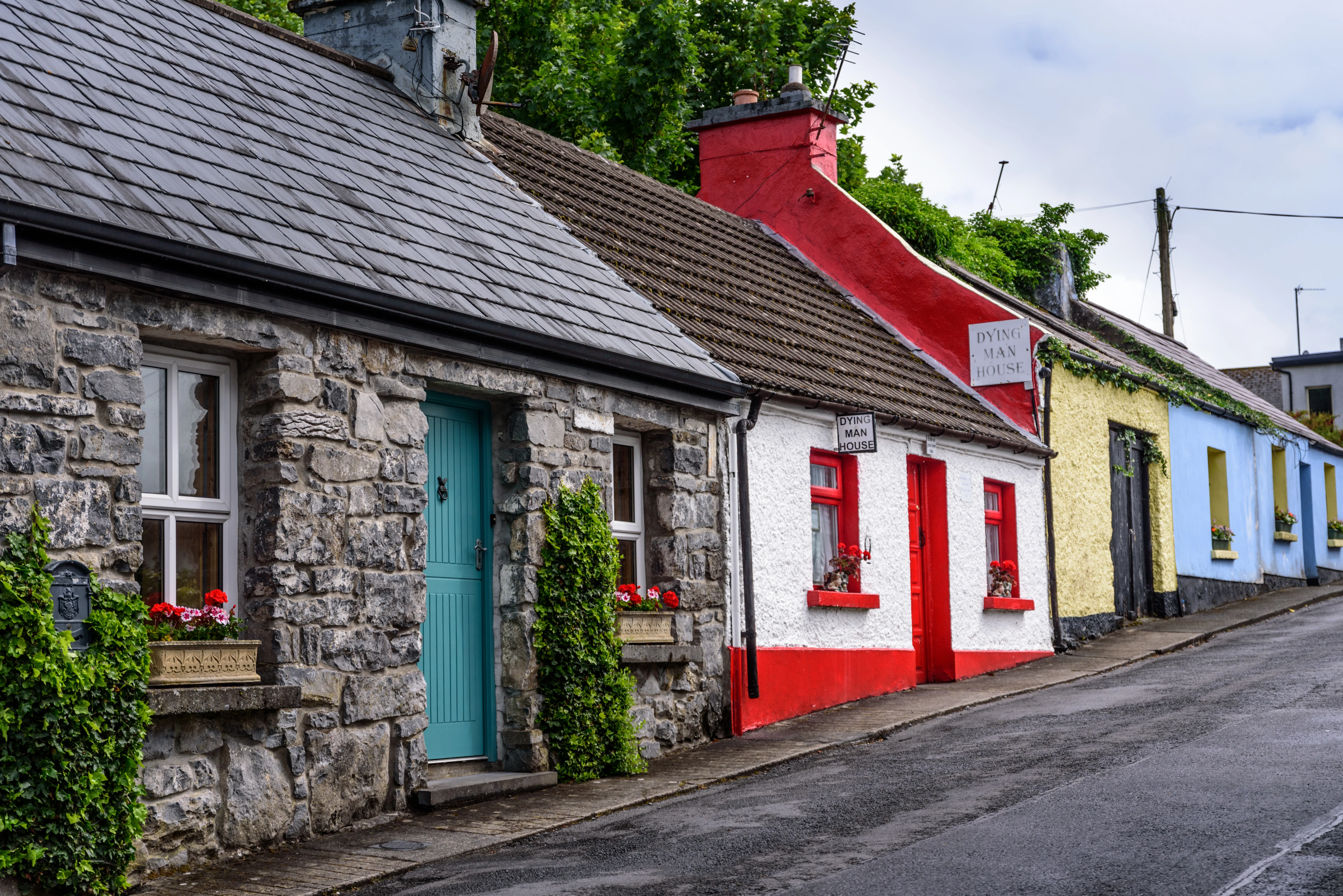 Colourful row of houses in a street in Cong, Ireland