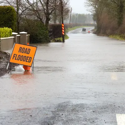 Irish Country Road Flooded, With Orange Road Flooded Sign